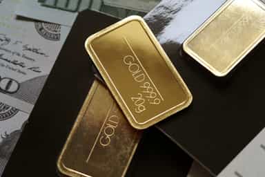 Gold gains on lower US dollar, yields; investors eye nonfarm payroll data