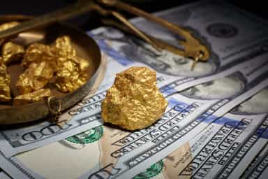 Gold heads for seventh straight monthly gain on safe-haven demand