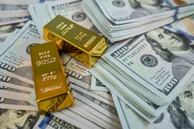 Gold slips but on track to snap four-month losing streak