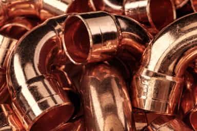 Copper recovers from early losses while closing higher in Shanghai, despite rising inventories