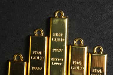 Gold slips on profit-taking after rally to over three-month peak