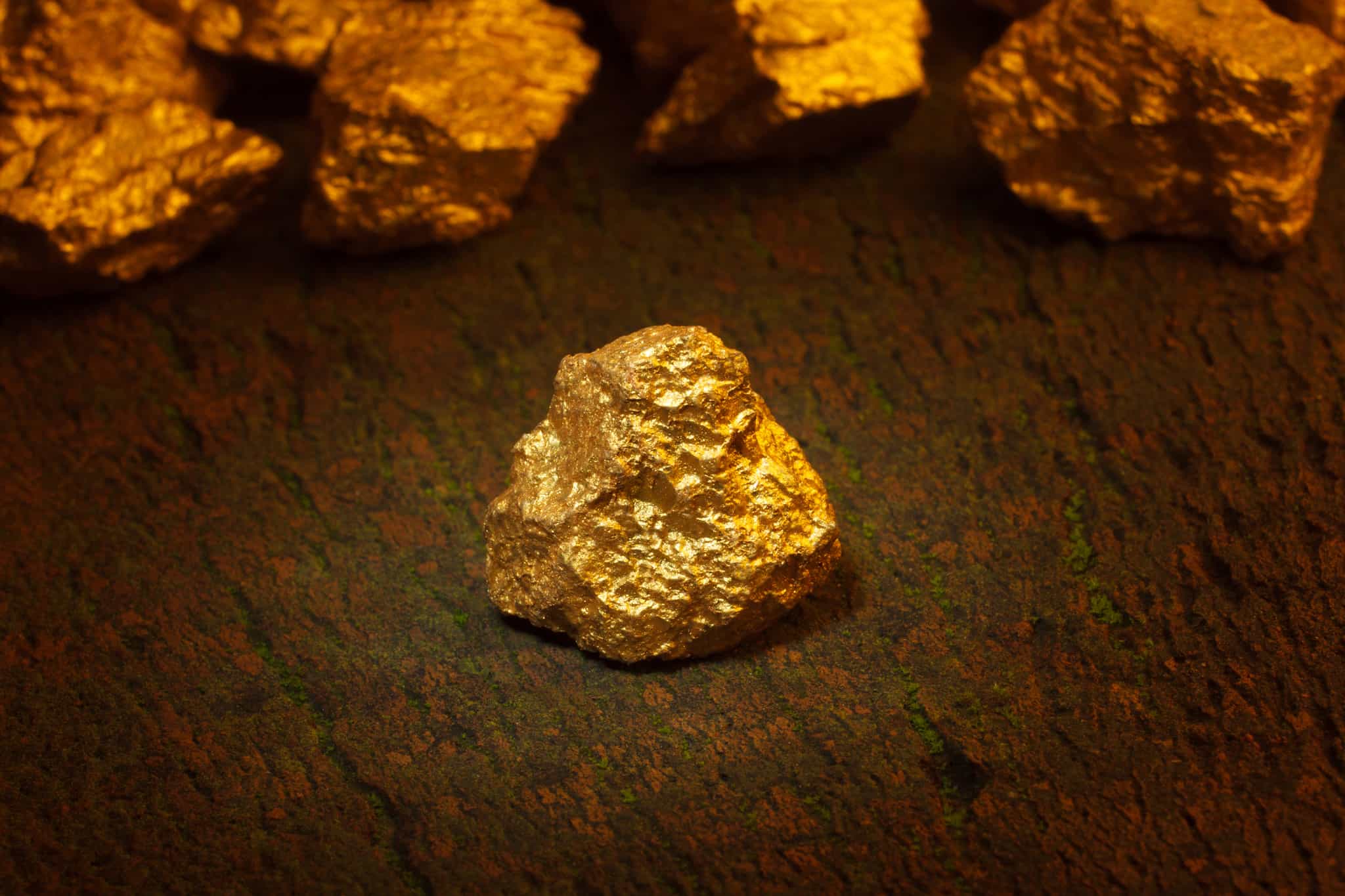 Gold slips on profit-taking after rally to over three-month high