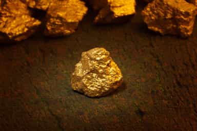 Gold slips on profit-taking after rally to over three-month high