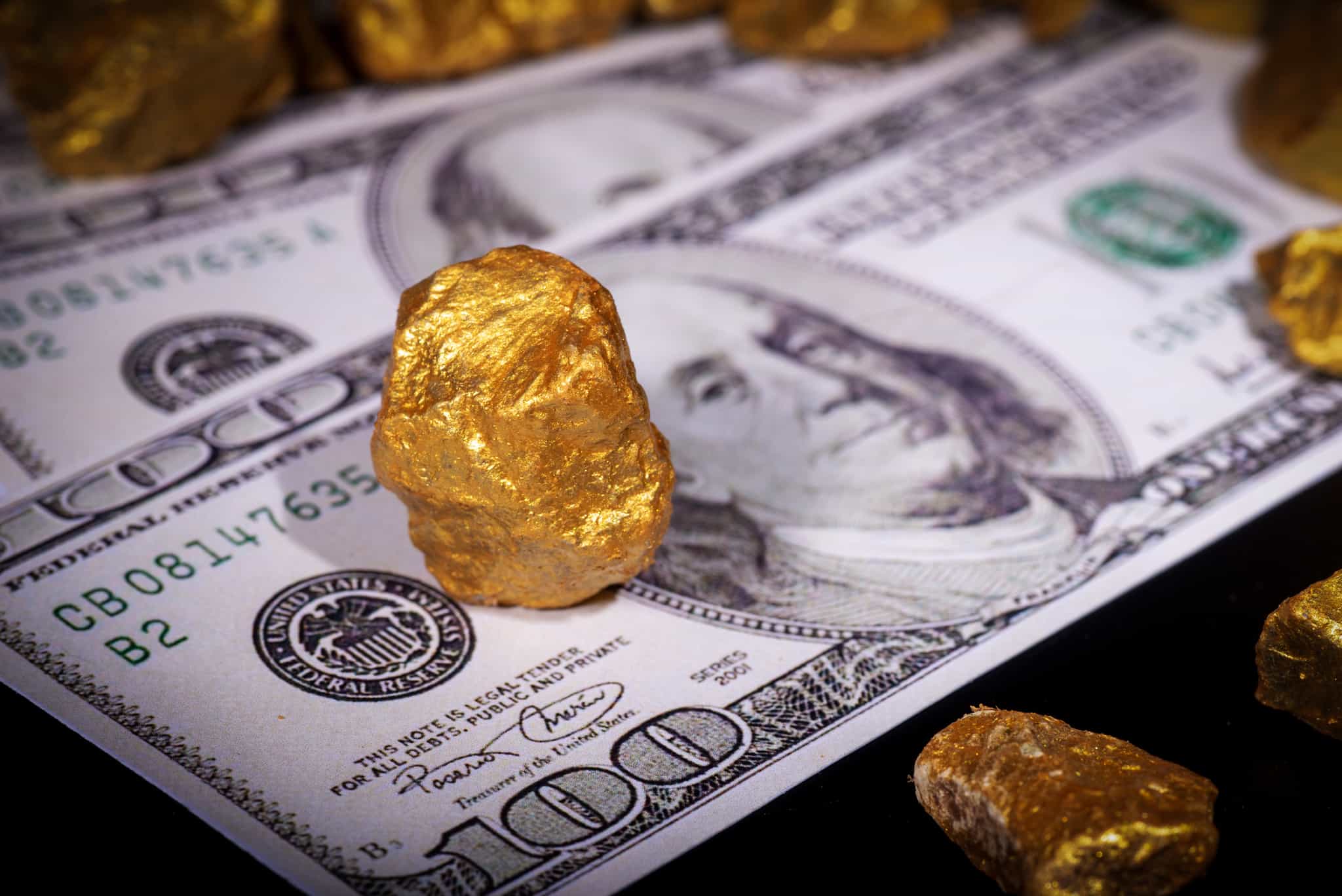 Gold eases as strong US jobs data boosts Fed rate-hike bets
