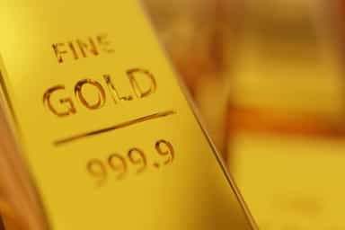 Gold slips on Fed policy tightening bets