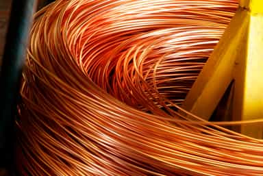 Copper falls on stronger dollar, Chile supply worries cap downside