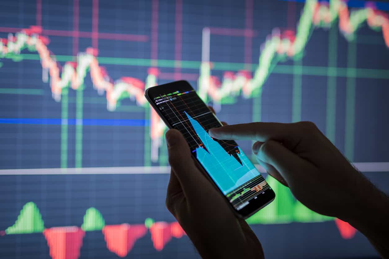 Stocks weather bond volatility, oil eases slightly