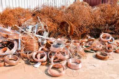 Copper ticks up as Fed rate hike bets cool