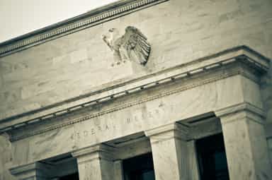 Gold inches lower as firmer dollar, higher yields weigh