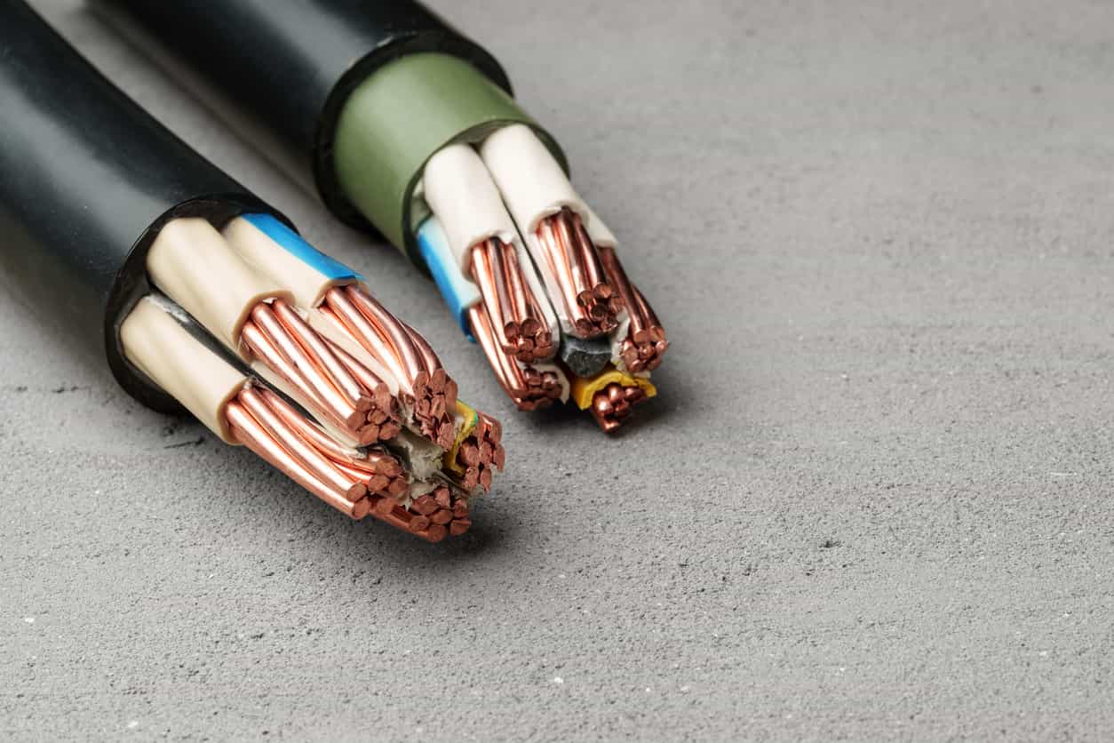 Copper ticks down as dollar weighs ahead of China return