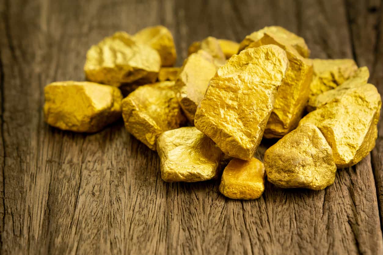 Gold edges up after hitting 2-month low as markets weigh Fed rate path