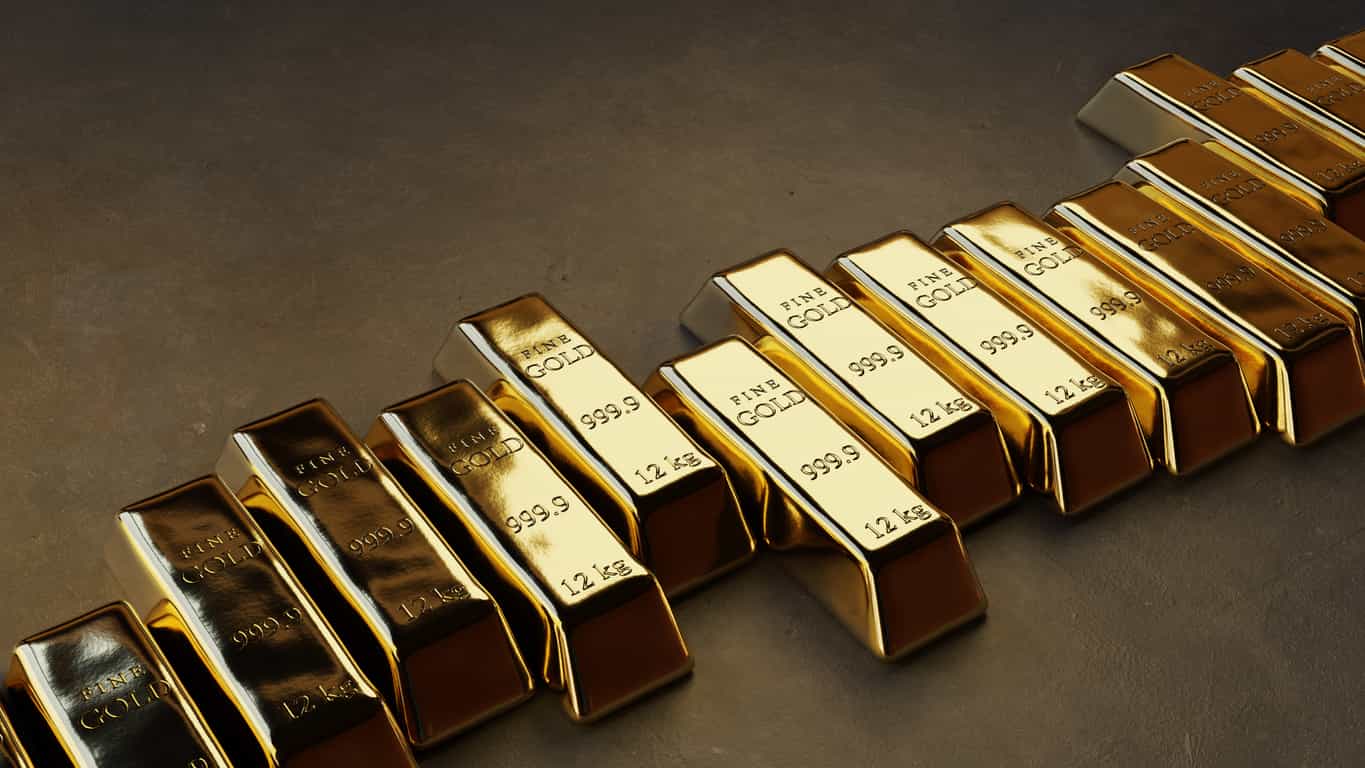 Gold rises as investors weigh Fed rate outlook, lower oil prices