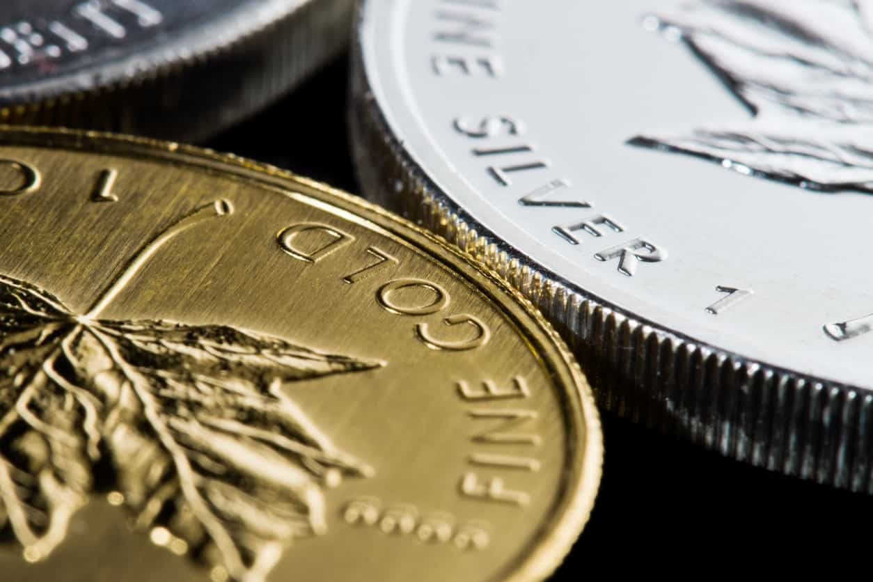 Gold eases on firmer dollar ahead of Fed decision