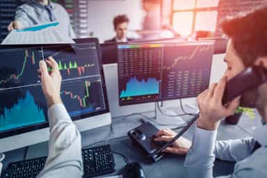 Stocks and dollar hold firm at start of action-packed week