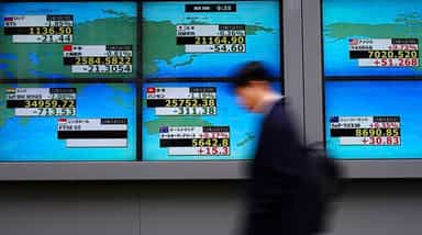Asia shares edge higher, oil slips as Suez Canal ship re-floated
