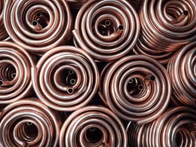 Copper hits record near $12,300 on US GDP growth, weak dollar