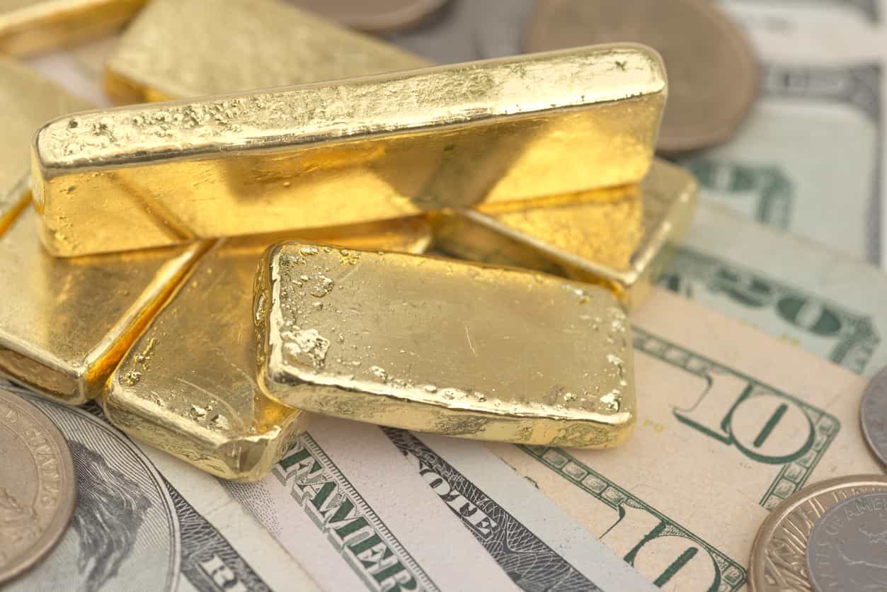 Gold set for third weekly loss amid stronger dollar, reduced Fed rate cut hopes
