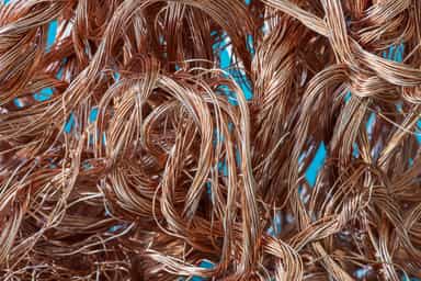 Copper breaks four-session win streak on firmer dollar, China worries