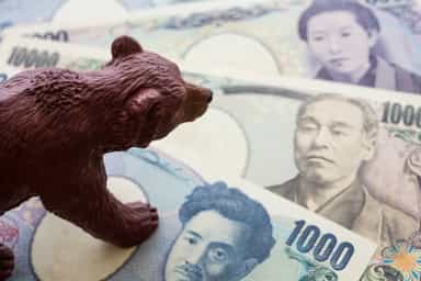 Asian stocks slide on weak China data, yen firms after BOJ decision