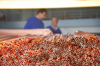 Copper falls from near-record highs on profit-taking and firmer dollar